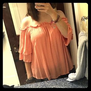 pink off the shoulder shirt